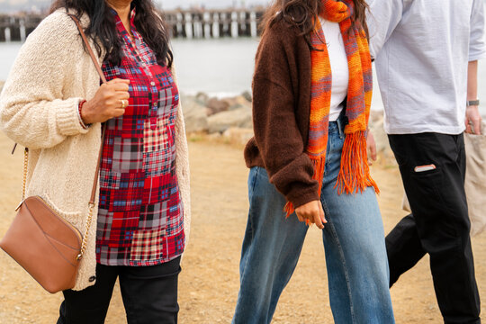 Friends Walking Along the Shore together cold Day sightseeing