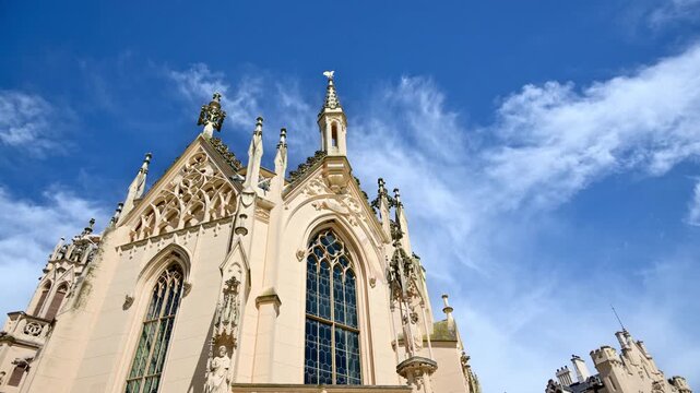 The chapel entrance of Lednice Castle with a pointed arch portal and carved pinnacles, Czech Republic