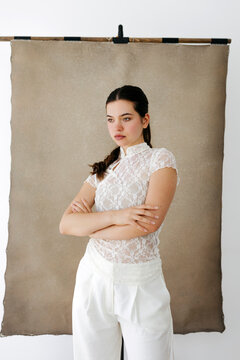 Woman modeling white lace outfit