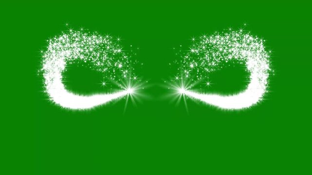 White glowing sparkle light trails crossing and forming a symmetrical magical pattern on green background