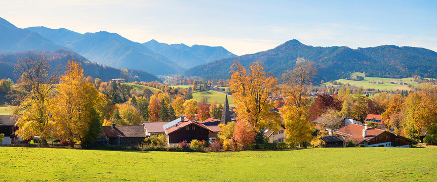 Fischbachau village center in an autumnal setting, bavarian landscape panorama with alps
