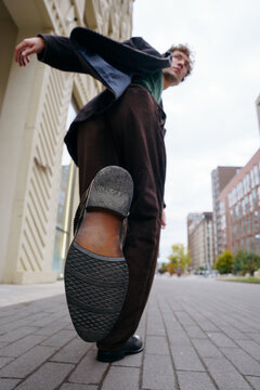 Confident professional walking through the city
