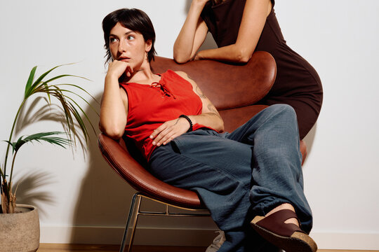 Woman lounging in chair