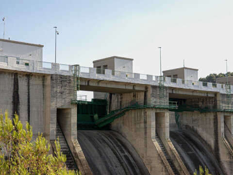 Close up view of control towers, walkways, and crest structure at Beniarres Dam in Spain during daytime