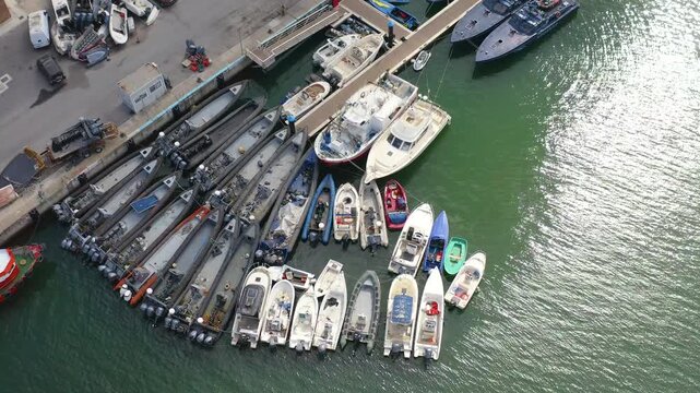 Aerial view of a large group of drug boats captured by the Spanish Customs Service coast guard in the Strait of Gibraltar, Spain. 