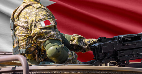Obraz premium Bahrain flag with soldier at machinegun turret