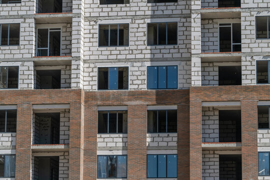 New apartment building under construction showcases modern architecture and urban development