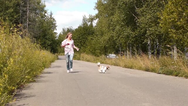 beautiful woman with dog leash