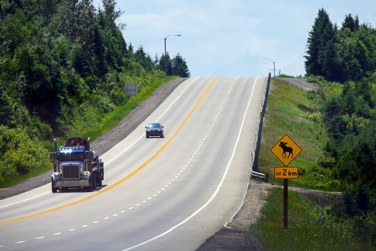 Canadian road with a &lsquo;Beware of Moose&rsquo; sign