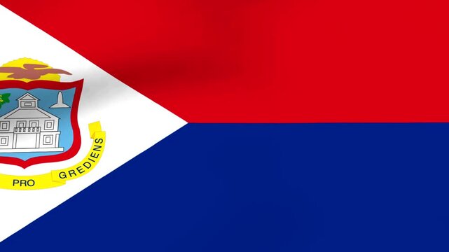 Waving flag of Saint Martin featuring red white and blue colors with central national coat of arms