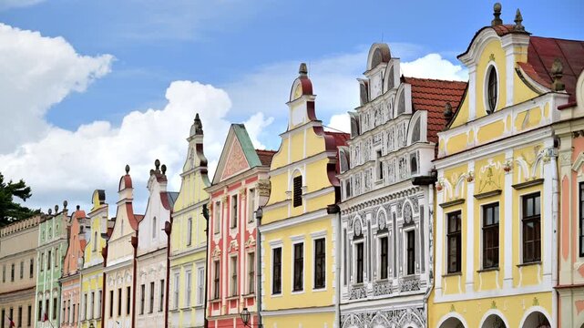 View of a row of colorful Renaissance gabled townhouses on the historic square, Telc, Czech Republic