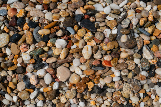Rock background wallpaper. Smooth stones. Colorful stones. 