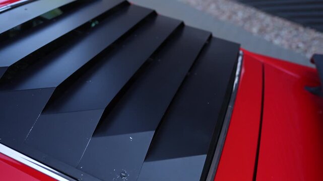 Grille on the rear window of an American muscle car