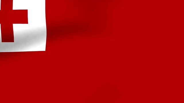 Waving flag of Tonga featuring a red field with a white canton containing a red cross