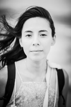 Model poses in windy summer day