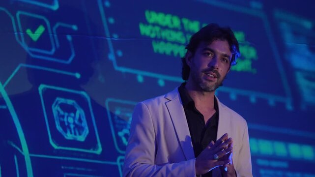 Businessman presenting in high-tech corporate setting with digital interface, conveying leadership, innovation, public speaking, digital transformation, business technology, effective communication.