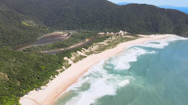 Drone Panoramic View of Lagoinha do Leste Beach and Wild Lagoon in Florianopolis Brazil, Pristine Sand Dunes and Dense Atlantic Forest Mountain Coastline, Remote Wilderness Travel Stock Video
