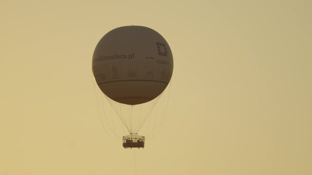 Krakow tethered observation balloon flying at sunset in Poland