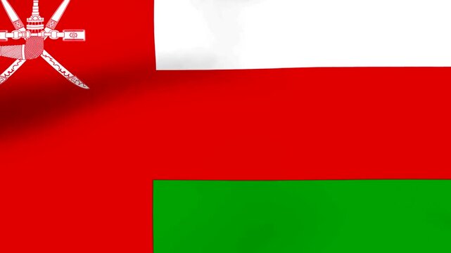 Waving national flag of Oman featuring white red and green stripes with emblem