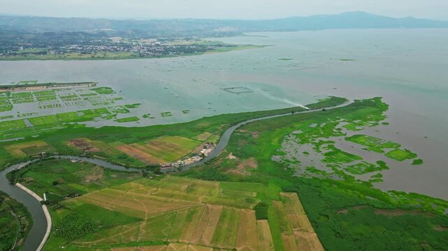Villa Bernardo Farm. Aerial documentary view of rice agriculture in Morong, Rizal showing the connection between farmers, crop cultivation, and local food production.