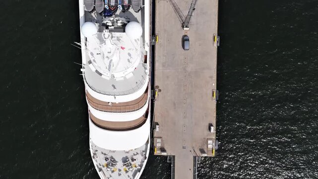 Aerial Top Down View of Passenger Ship Docked at Pier