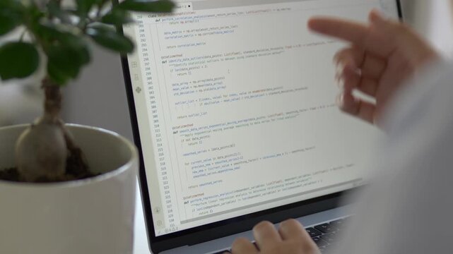 Programming code displayed on laptop during coding session with light design. Software development, programming education and independent technical skill building concept.