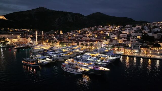 Night Aerial View Of Boats In Hvar Harbor, Croatia