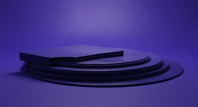 Stack of blank cds on reflective surface with blue light