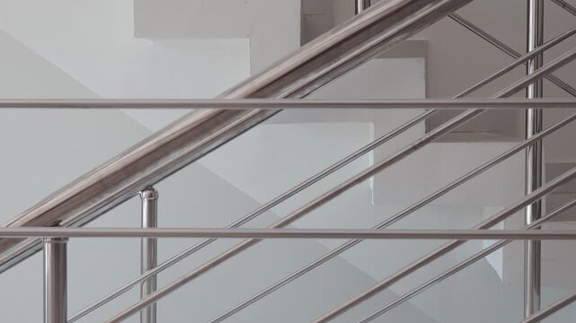 A simple yet elegant white staircase featuring a clock at the top, perfect for use in illustrations and designs