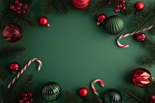 Festive Christmas and New Year Holiday Border Decoration with Ornaments and Pine Branches for Greeting Cards and Invitations