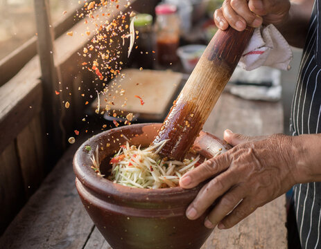 Authentic Thai Street Food Preparation, Chef Cooking Pad Thai in Wok, Tom Yum Soup, Som Tum Papaya Salad, Khao Soi, and Mango Sticky Rice