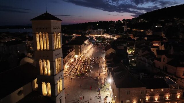 Hvar Bell Tower Illuminated Over The Main Square At Night
