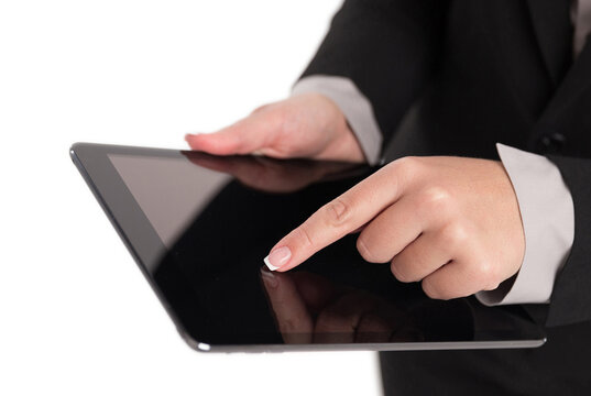 Business woman pointing with finger on Digital Tablet isolated on white