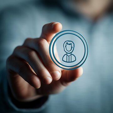 Hand touching a user profile avatar target icon representing target audience selection customer segmentation personal identity marketing strategy and human resources management concept
