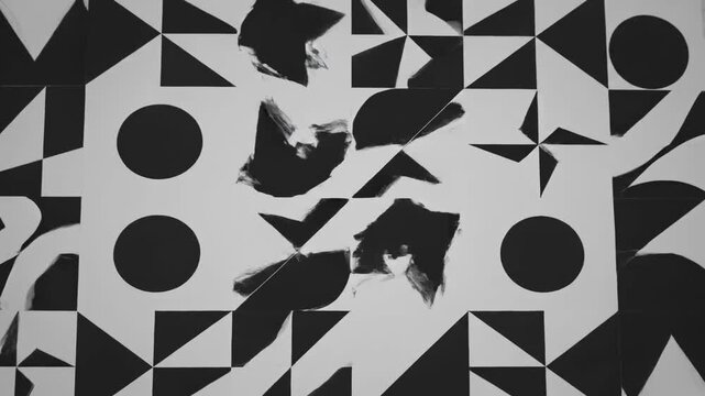 Abstract Geometric Motion: Black and white minimalist pattern featuring circles, triangles, and squares in a grid layout, ideal for modern background visuals.