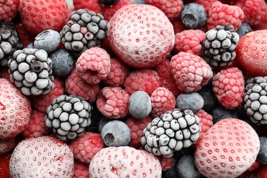 Many different frozen berries as background, top view