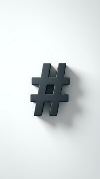 Dark gray hashtag symbol casting a shadow on white background