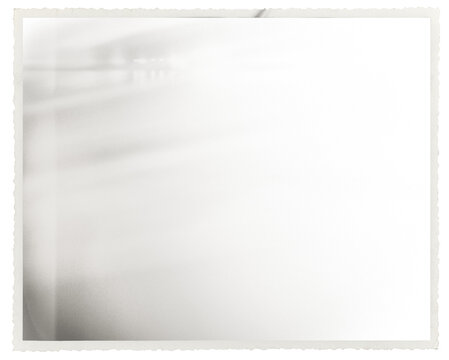 Retro photo paper frame with scalloped edge and light leak overlay isolated on transparent background. Scanned material for vintage photo frames and templates.
