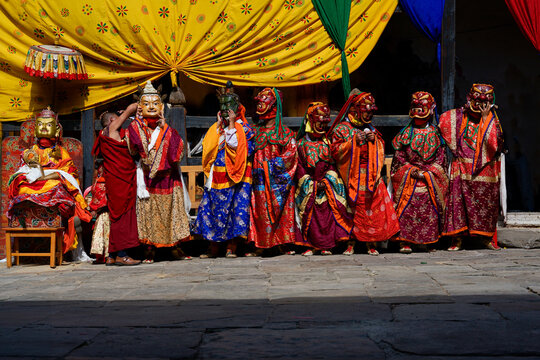 Bumthang in Bhutan at the yearly festival in the monastery of Jakar. A monk is dancing in his colourful traditional dress and mask