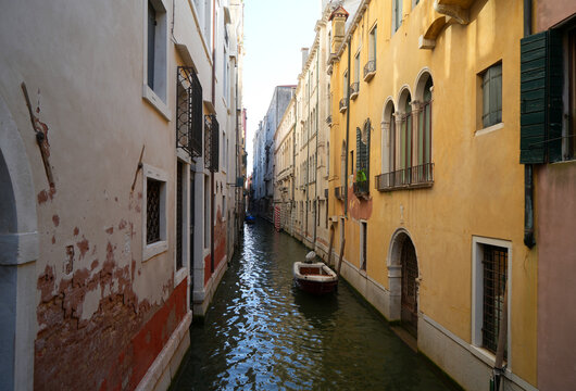 Venice, Italy, a canal with boats and houses