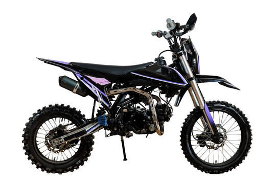 Modern black and purple dirt bike motocross motorcycle isolated on white background studio shot..