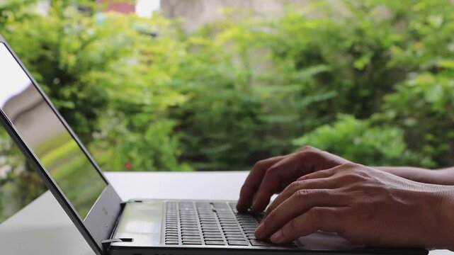 2FA Cyber security protection concept. Businessman working on a laptop to login password two-step authentication, verification code on smartphone screen for identity identification for online banking.