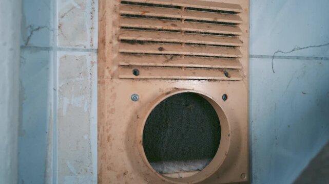 Old Dirty Ventilation Grille Close Up: Rusty Dust-Covered Air Vent Cover on Ceramic Tile Wall | Abandoned Industrial HVAC System Neglect | Slow Push-In Camera Movement