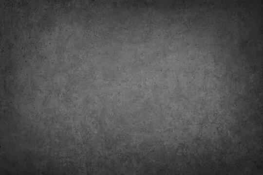 Dark dimly lit concreted floor surface