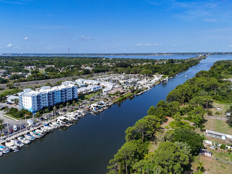 Condo, homes, and a marina located along the Barge Canal leading to the Indian River Lagoon in Merritt Island, Florida. 