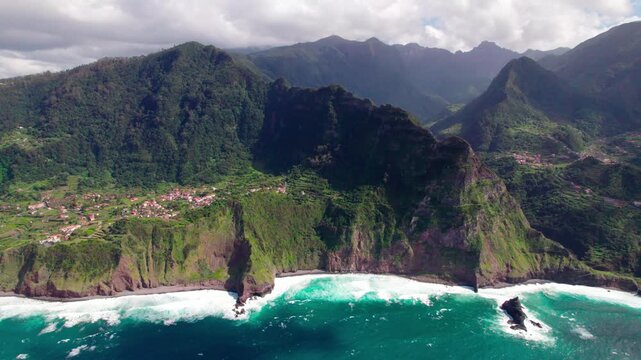 Rugged Northern Coast Of Madeira Island, Portugal From Guindaste Viewpoint In Faial. Aerial Drone Shot