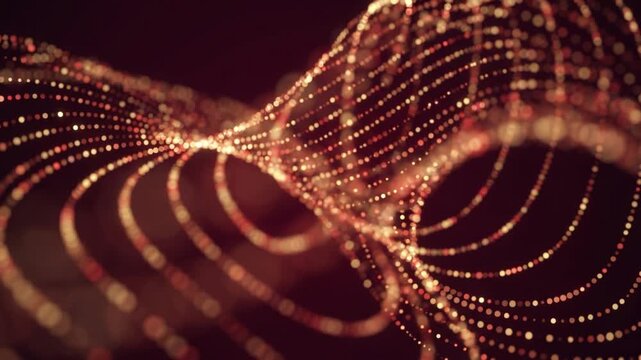 真鍮色と真紅の円形ボケが見えない磁力線に沿って流れる抽象的なマクロ映像。深いバーガンディ背景のループ動画。