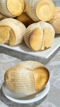 Delicious cassava starch muffins (homemade baked treats made with sour cassava starch). Fresh muffin with a crispy crust and an airy interior. Muffin. Cheese muffin.