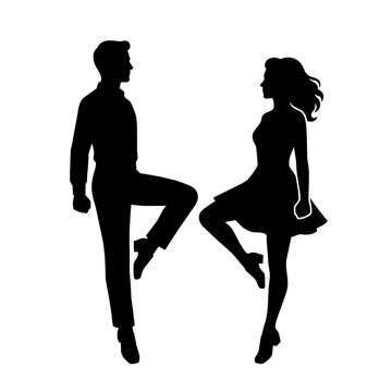 Silhouette of a man and woman dancing swing or rock and roll