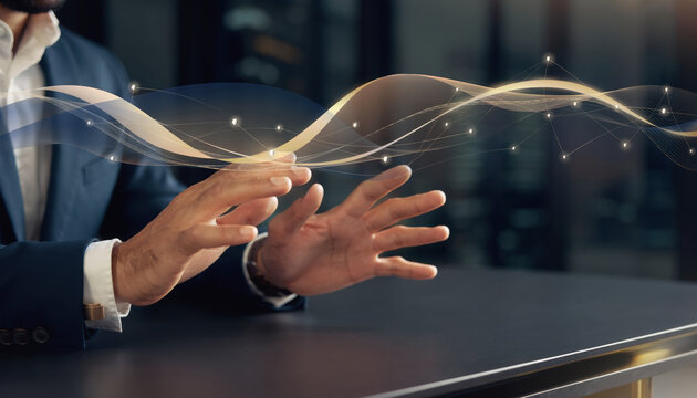 Businessman hand gesture with ai technology slides visualizing digital data flow in modern office environment at night